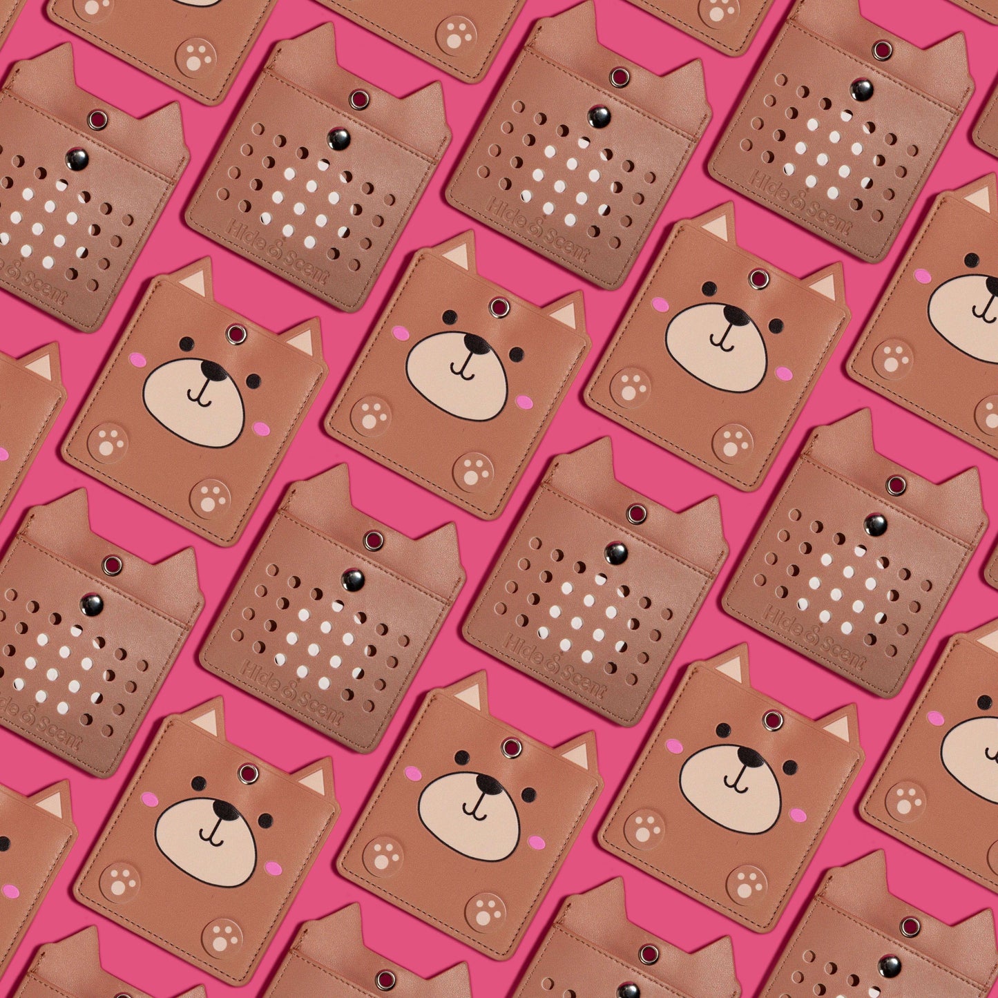 Group of Hide&Scent Kids Edition dog pouches on a pink background, showcasing the front and back of each pouch.