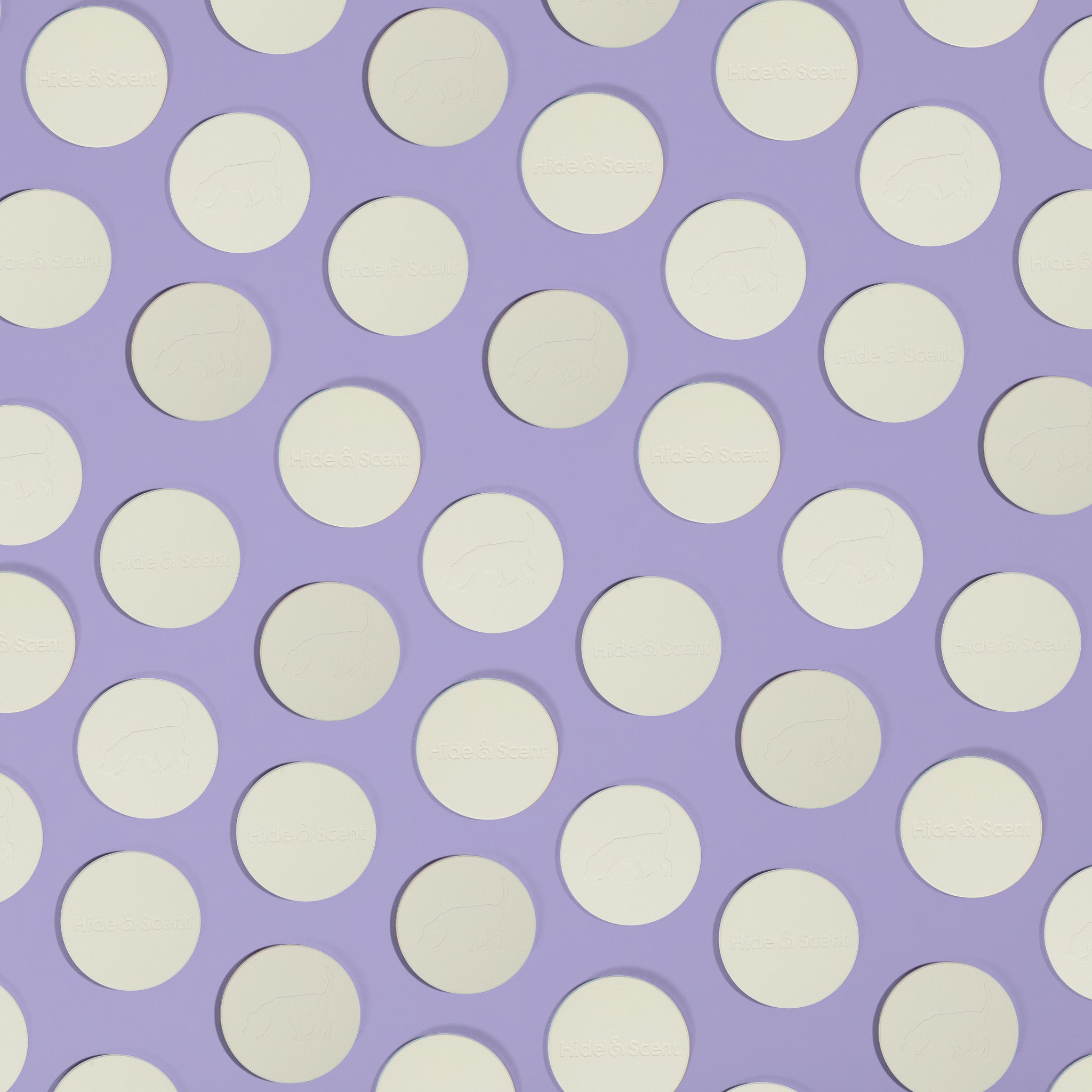 Hide&Scent Scent Stone Pattern on a purple background - embossed sniffing dog can be seen on the scent stone